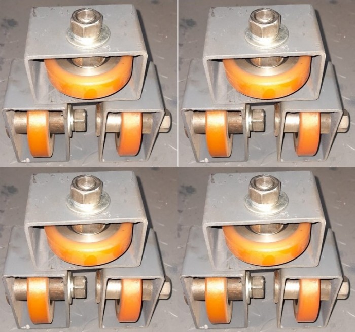 COMP-229 Комплект роликов полиуретановых для подъемников 500-1500кг (с осями и крепежными кронштейнами) 